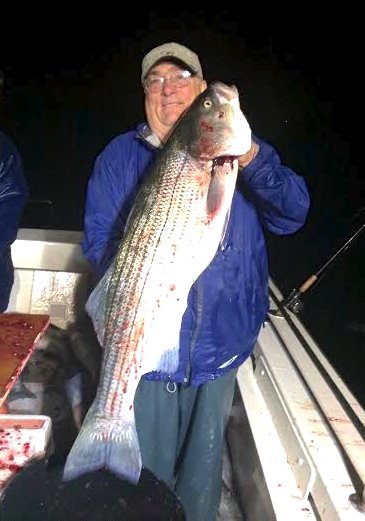tomhollandwitha33lbstriper43inches.jpg